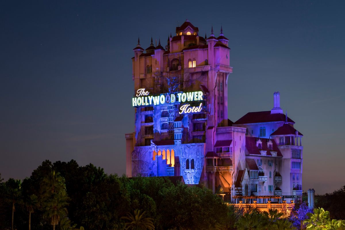 The Twilight Zone Tower of Terror lit up at night on Sunset Boulevard at Disney's Hollywood Studios, Walt Disney World Resort.